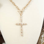 Divine Simplicity – Hammered Cross Front Toggle Necklace