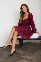 SMOCKED BISHOP SLEEVE TIERED MINI DRESS