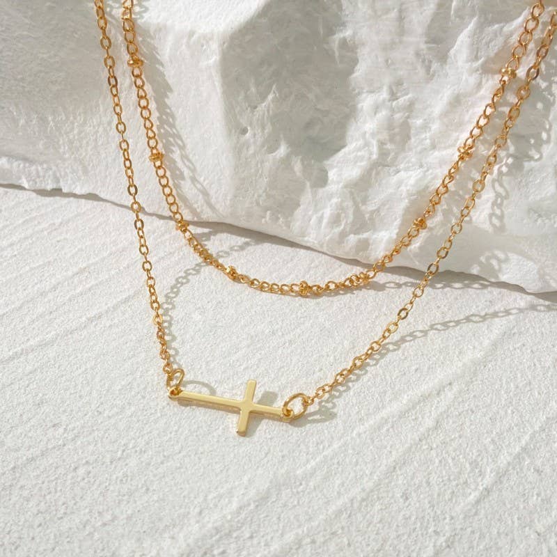 LAYERED CROSS NECKLACE