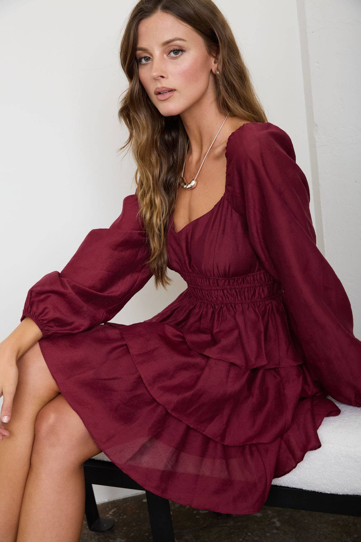 SMOCKED BISHOP SLEEVE TIERED MINI DRESS