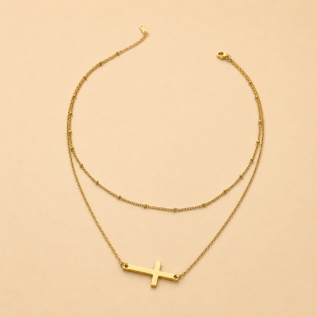 LAYERED CROSS NECKLACE